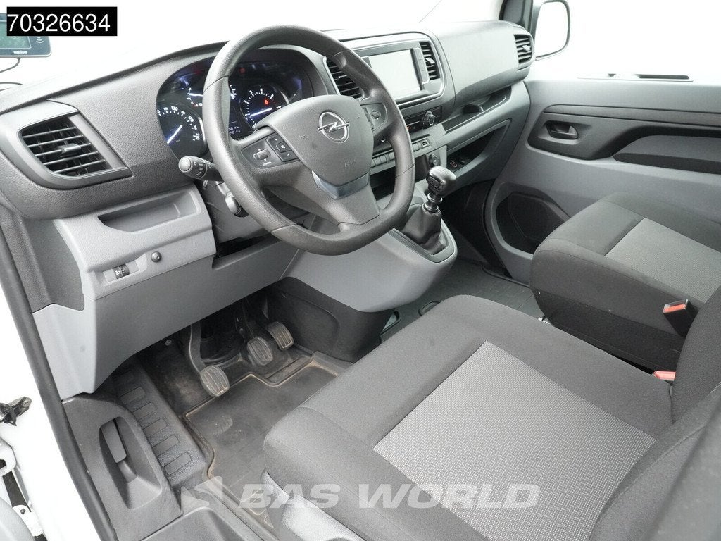 Opel Vivaro 102pk L3H1 Navi Airco Cruise Camera Parkeersenso, Auto's, Stof, Gebruikt, Euro 6, 4 cilinders