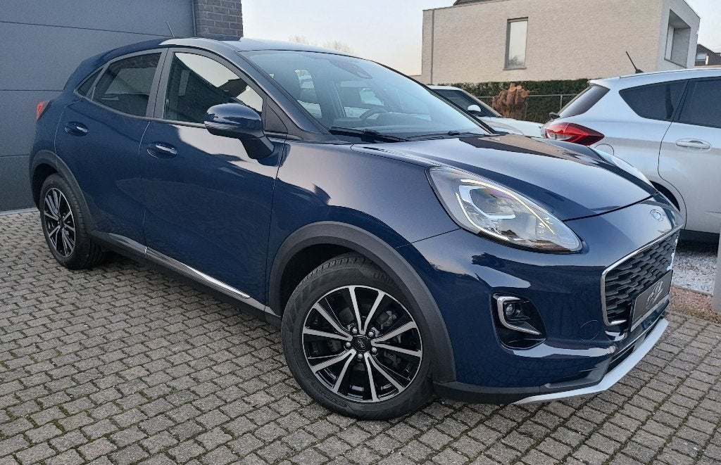 FORD Puma 1.0Hybrid Titanium +2JR GARANTIE*VEEL OPTIES!, Auto's, Voorwielaandrijving, Parkeerassistent, Puma, Blauw