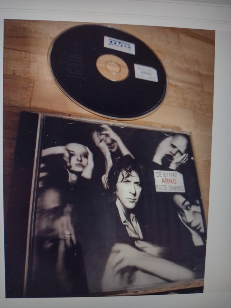 BELPOP CD: ARNO: IDIOTS SAVANTS : Les filles du bord de mer, Ophalen of Verzenden, 1990 - 1999, Zo goed als nieuw
