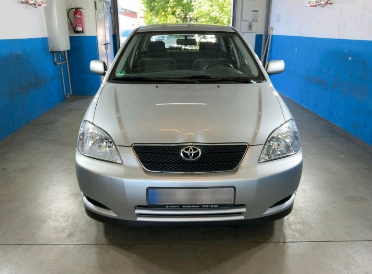 Toyota Corolla 1er propriétaire 65km, Auto's, Toyota, Stof, Zwart, 4 cilinders, 1600 cc