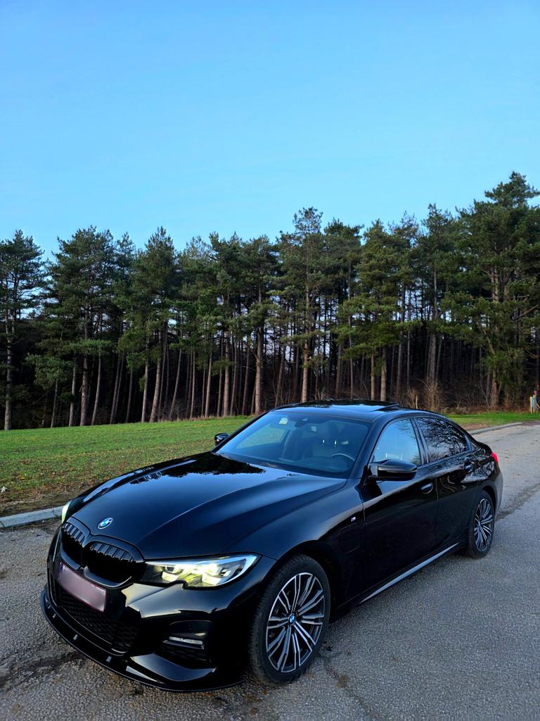 BMW 320e pack M avec garantie - 76 500km, Auto's, Automaat, Achterwielaandrijving, Zwart, Alcantara