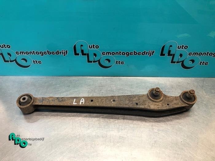Bras de suspension arrière gauche d'un Nissan Pixo (Pixo 09, -, 3 mois de garantie, Utilisé, -