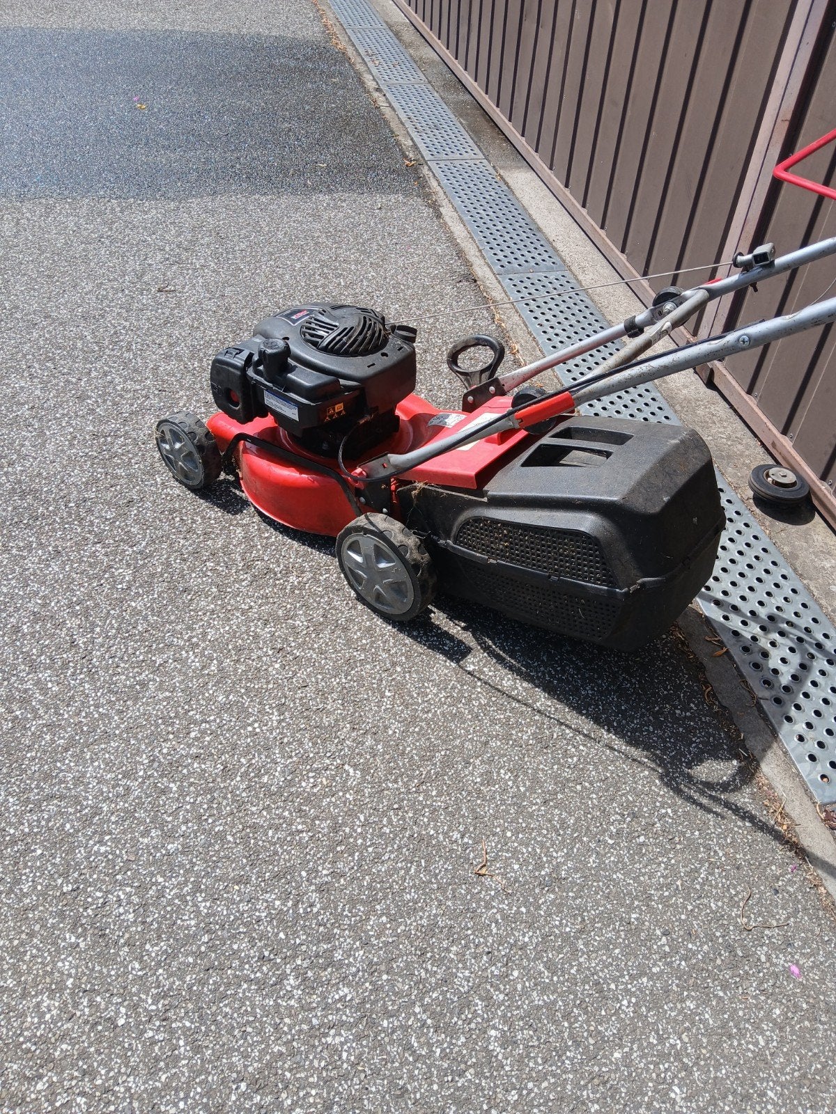 Grasmaaier, Ophalen