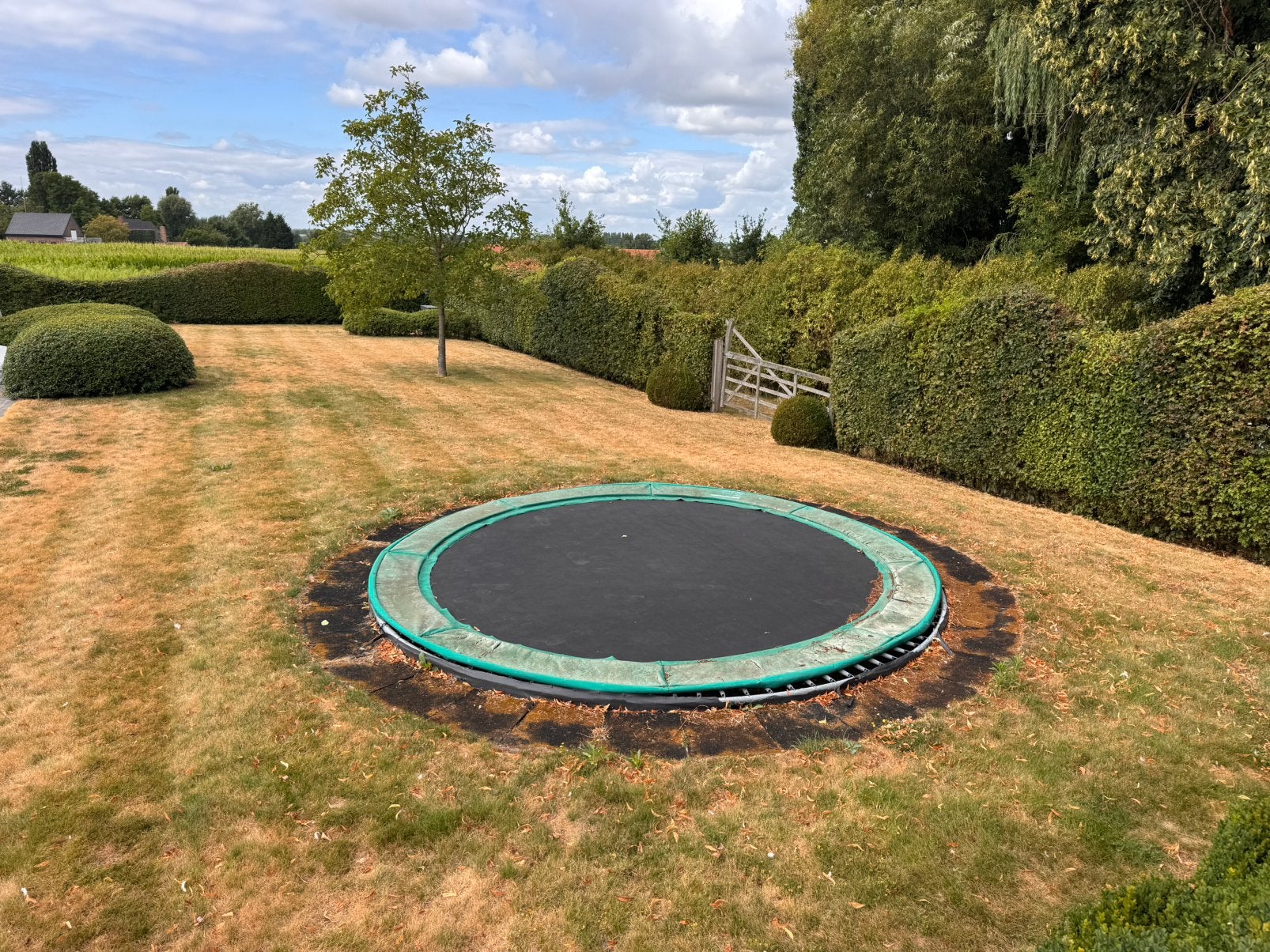 trampoline intégré 4m30 + bord de sécurité, Enlèvement, Utilisé