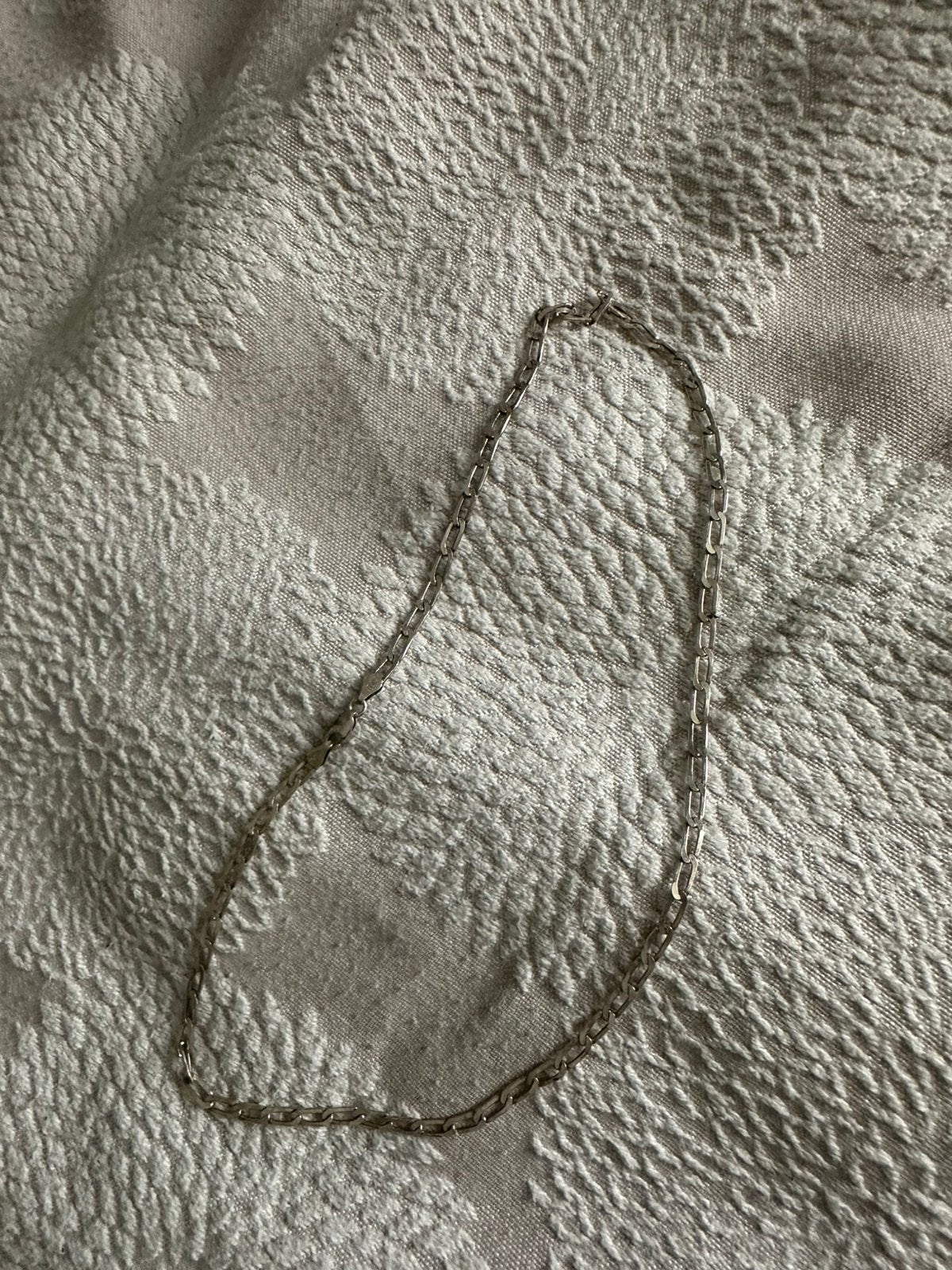 Zilveren ketting, Ophalen, Gebruikt
