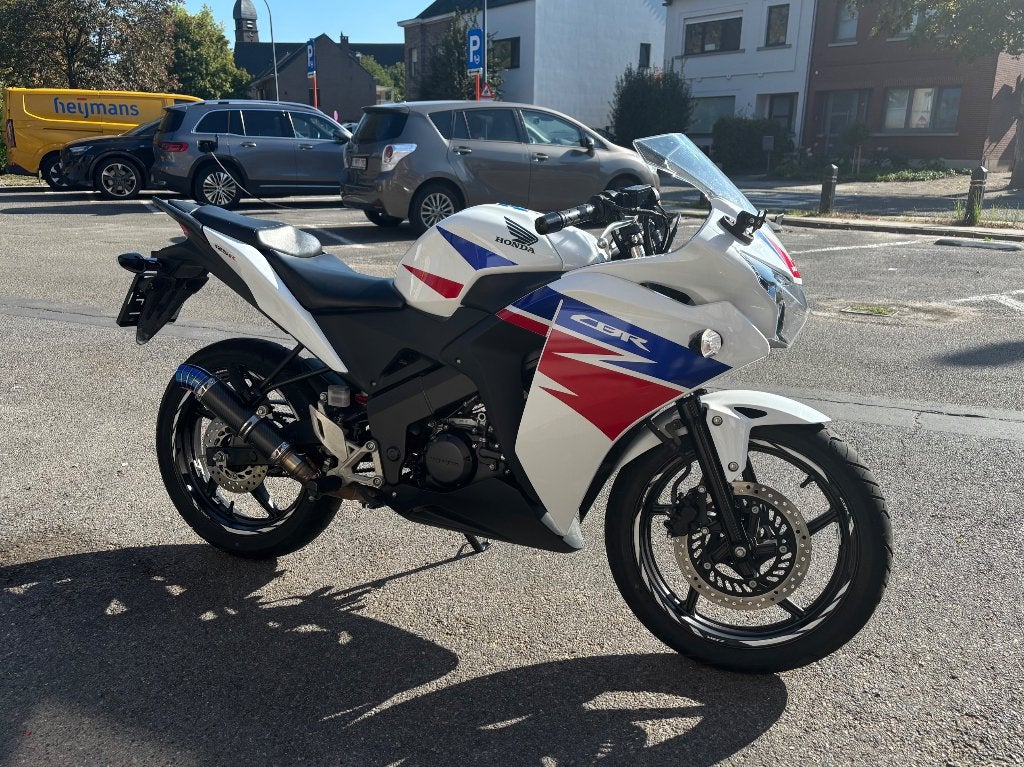 Honda cbr125r / 6900 km / 2014 / nieuwstaat, Sportuitlaat, Occasion, 125 cc, 11 kW of minder