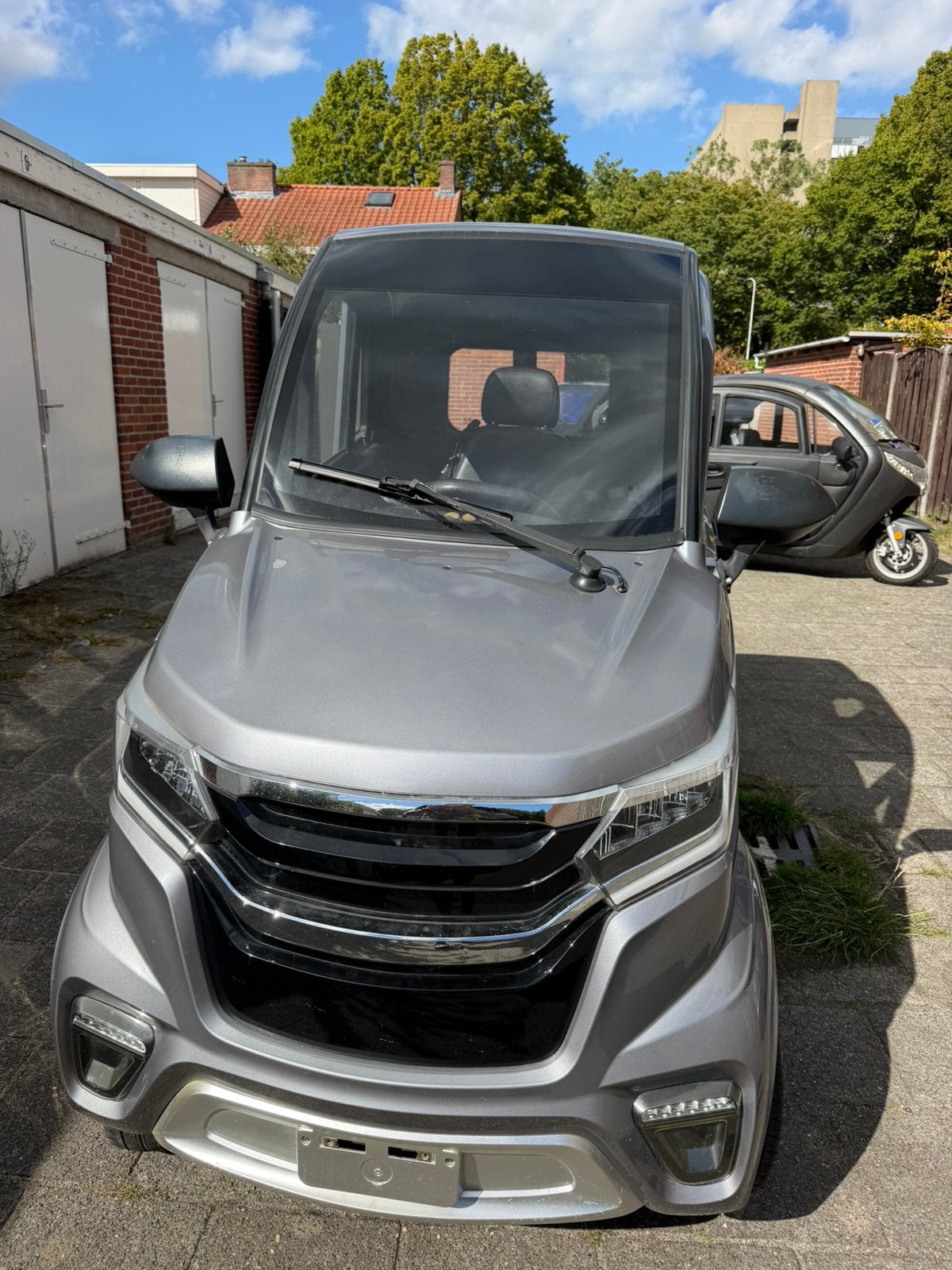 Overdekte scootmobiel econello, Ophalen