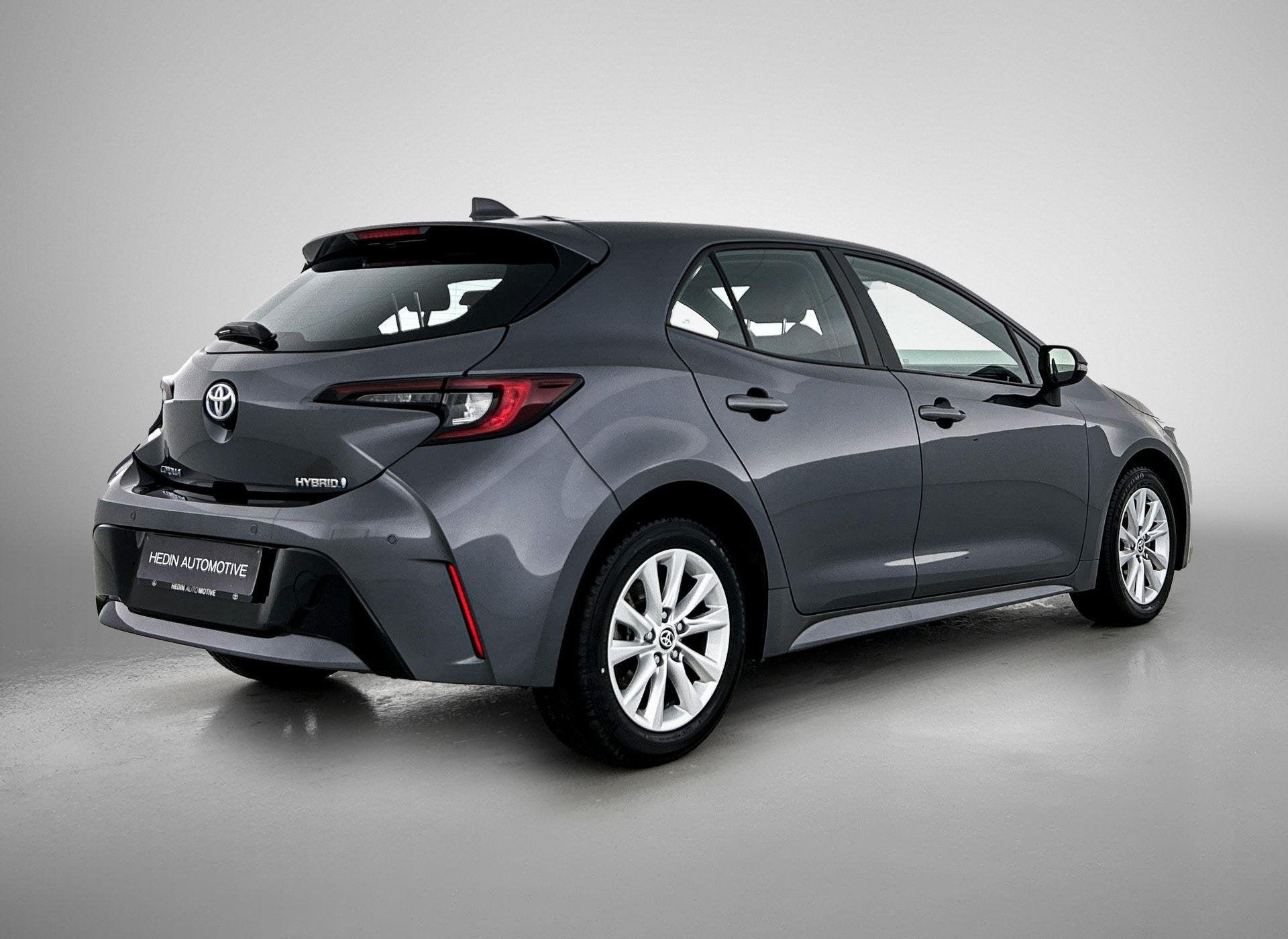 Toyota Corolla Hatchback 1.8 Hybrid e-CVT | Achteruitrijcame, Autos, Entreprise, 5 places, Automatique, Tissu