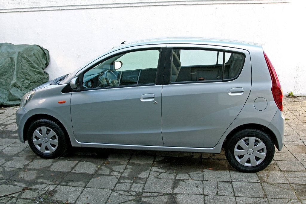 Daihatsu Cuore 1.0i Top uit 2009, Auto's, Voorwielaandrijving, 4 zetels, Stof, 765 kg