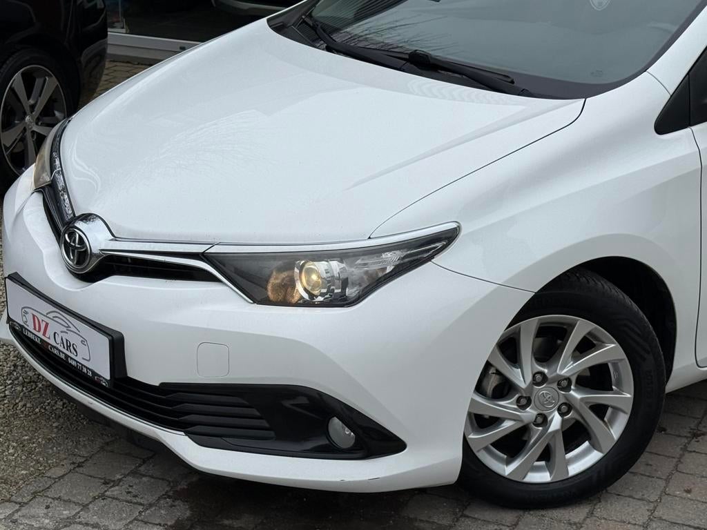 TOYOTA AURIS 1.6D 112PK |NAVI | CAMERA | CRUISE CONTROL |, Auto's, Stof, 4 cilinders, 1600 cc, Wit