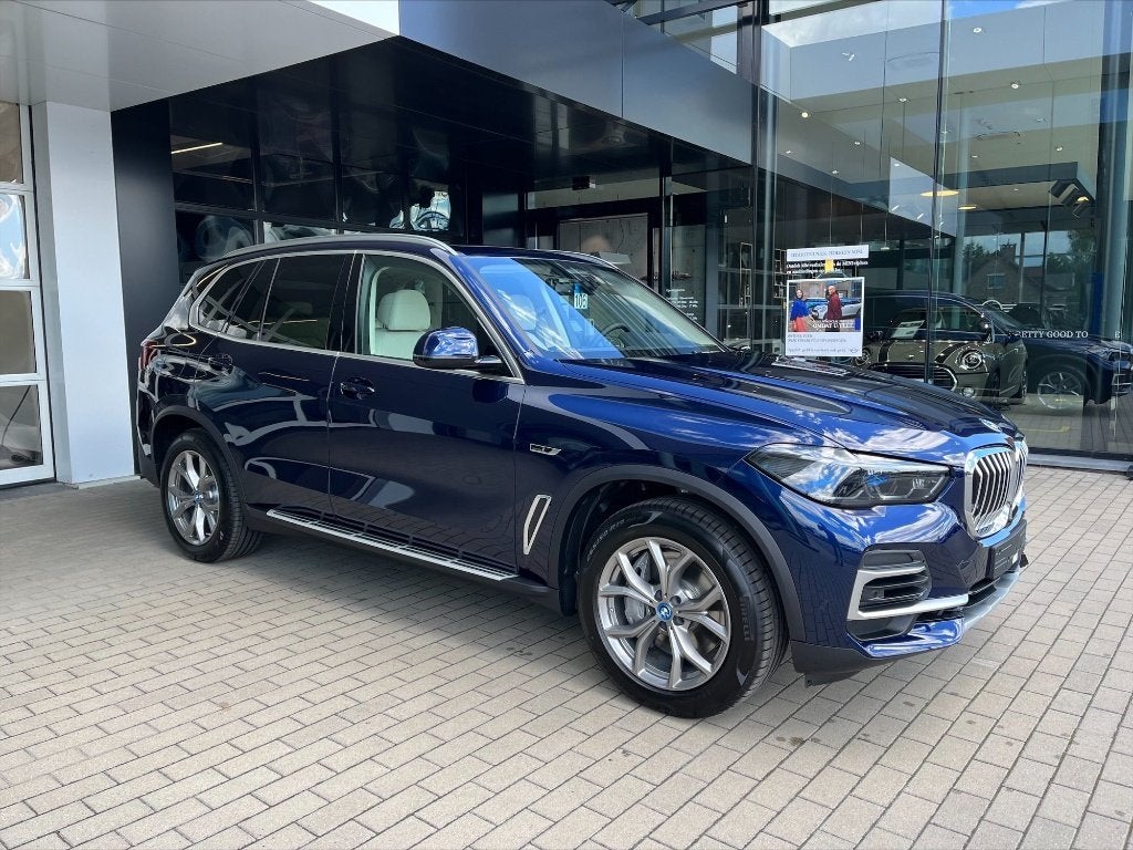 BMW X5 xDrive45e Individual, Auto's, Automaat, Verwarmde buitenspiegels, Blauw, Leder