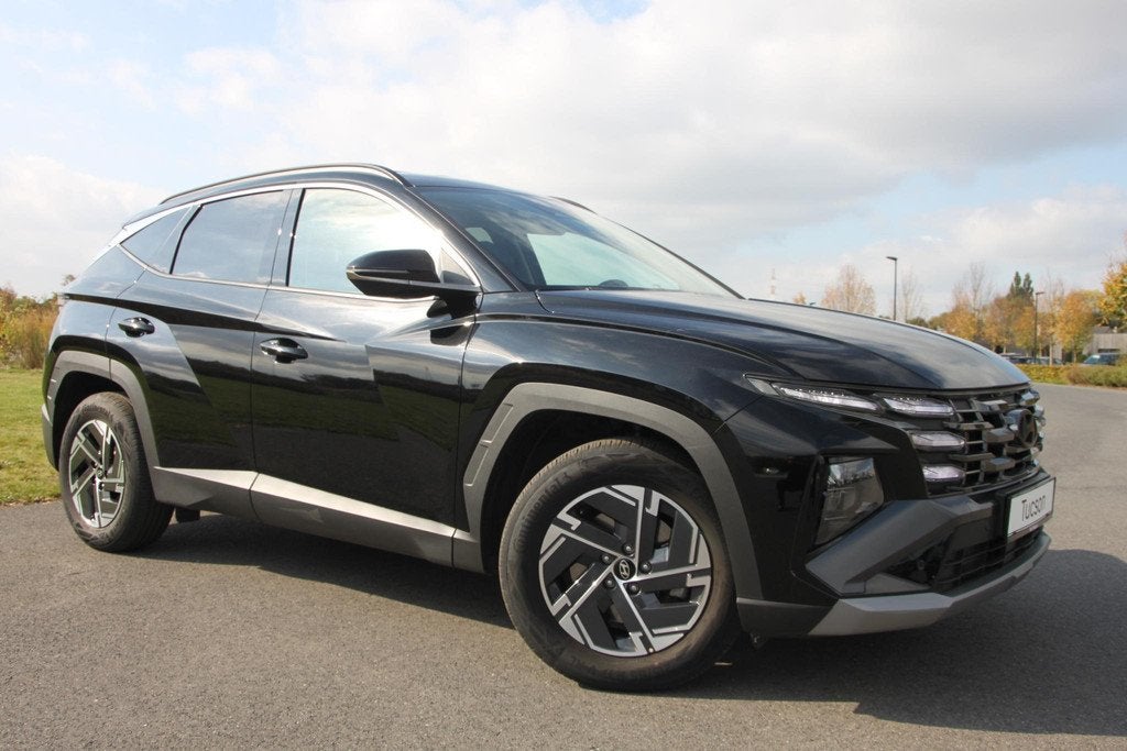 Hyundai Tucson 1.6 T-GDi 48V Feel 7-DCT | ACHTERUITRIJCAMERA, Auto's, Automatische klimaatregeling, Stof, Gebruikt, 4 cilinders