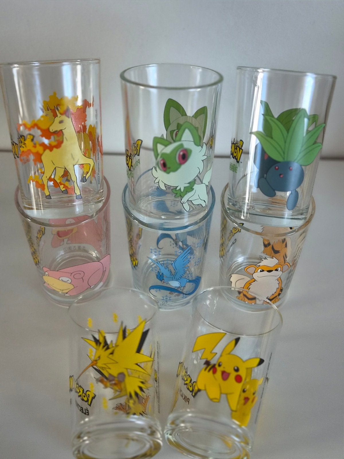 Pokemon glazen 8 nintendo glaasjes Pikachu Caninos Ramoloss, Ophalen of Verzenden, Nieuw, Waterglas