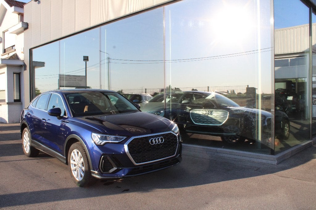 AUDI Q3 SPORTBACK PHEV 45 TFSIe S TRONIC, Auto's, Automaat, Dealer onderhouden, Blauw, Leder