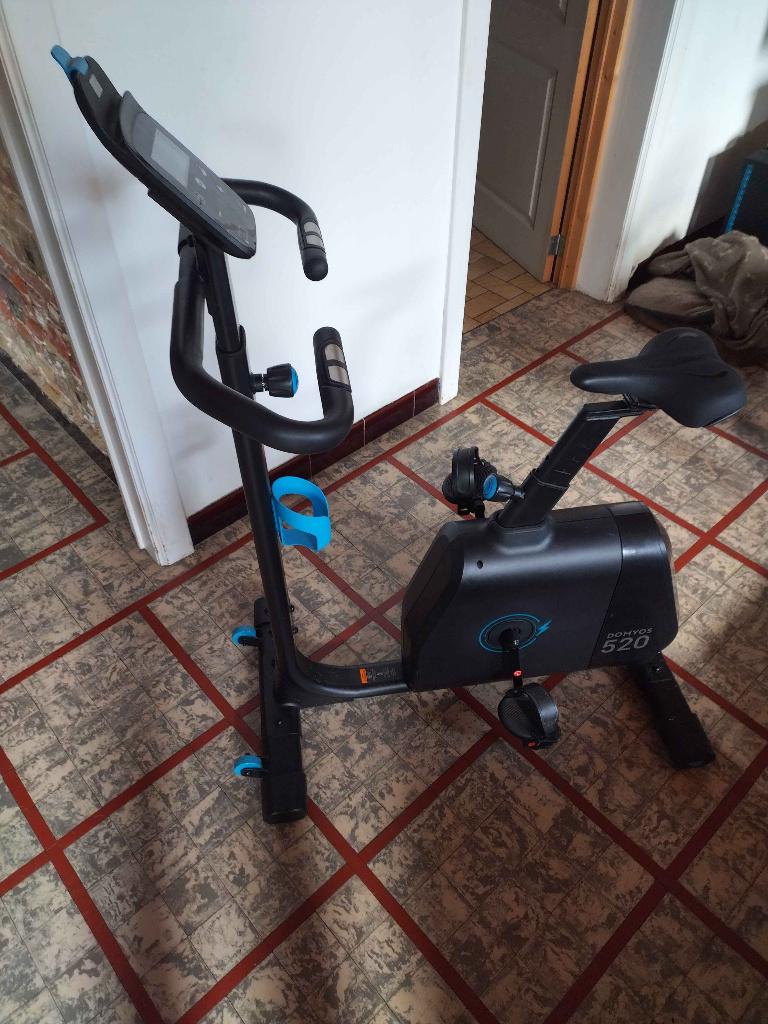 velo domyos 520, Sports & Fitness, Enlèvement, Utilisé, Jambes, Vélo d'appartement