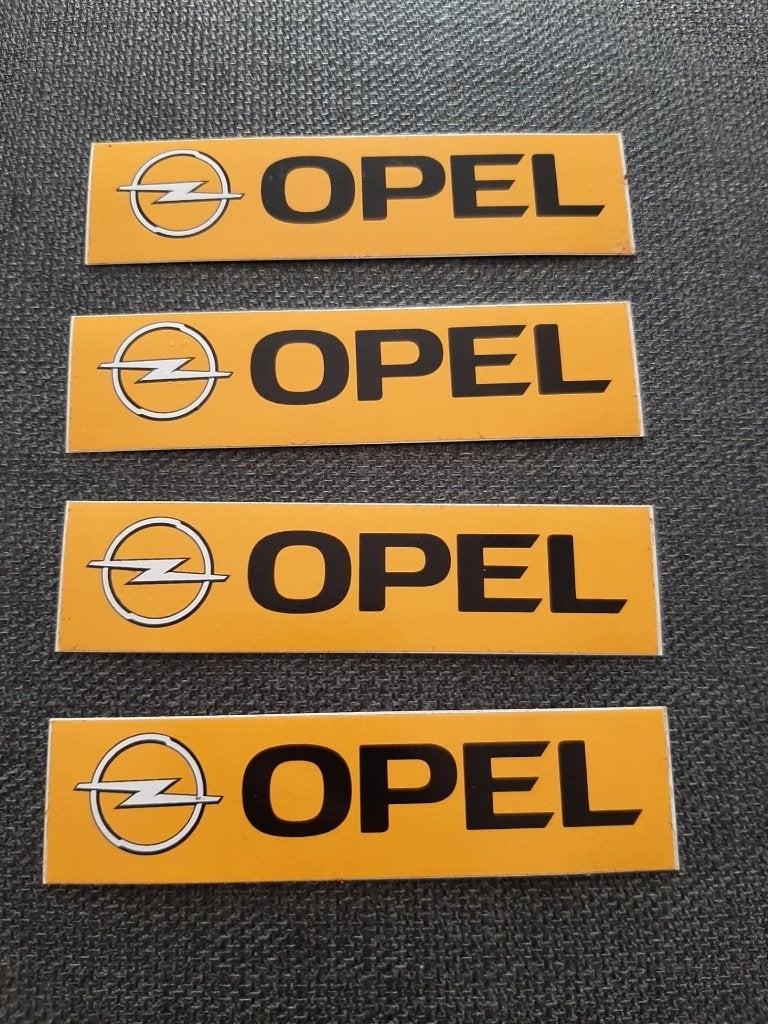 4 stickers Opel geel zwart 10 cm op 2,5 cm, Ophalen, Zo goed als nieuw, Meerdere stickers
