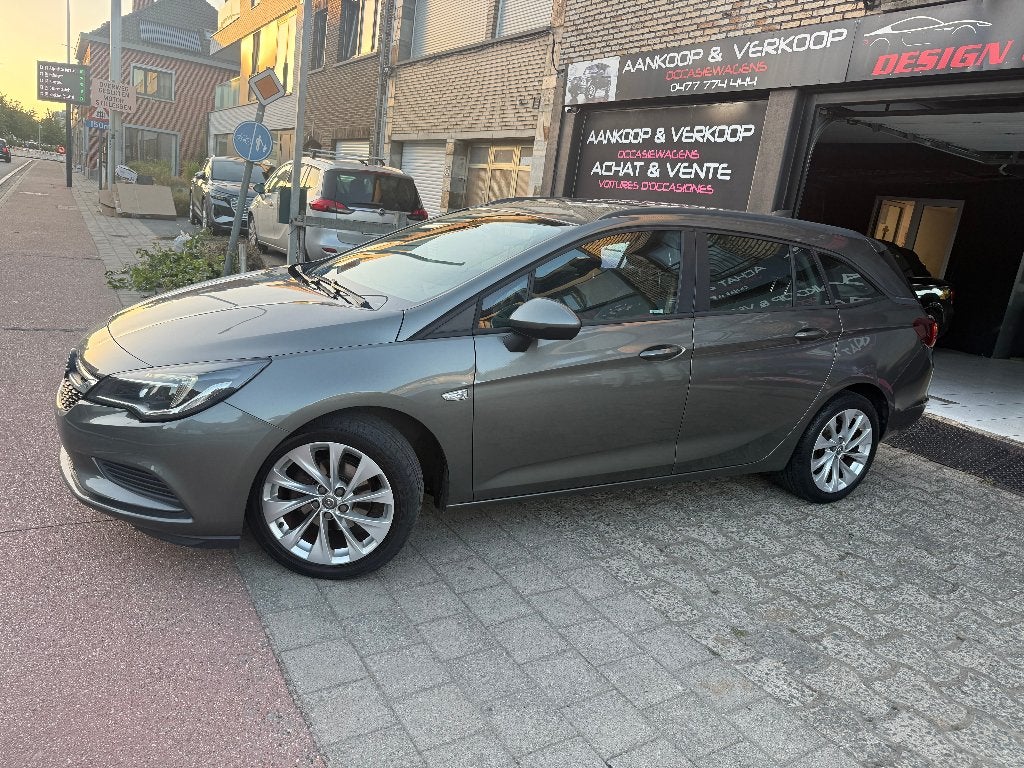 Opel Astra 1400cc Benzine 4-cilinder Navi Garantie, Auto's, Euro 6, Bedrijf, Navigatiesysteem, Break