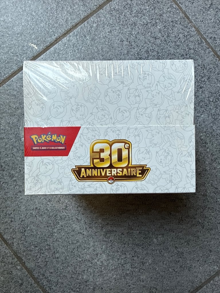 Pack scellé Tin Pokémon 30ans, Enlèvement ou Envoi, Neuf, Booster box