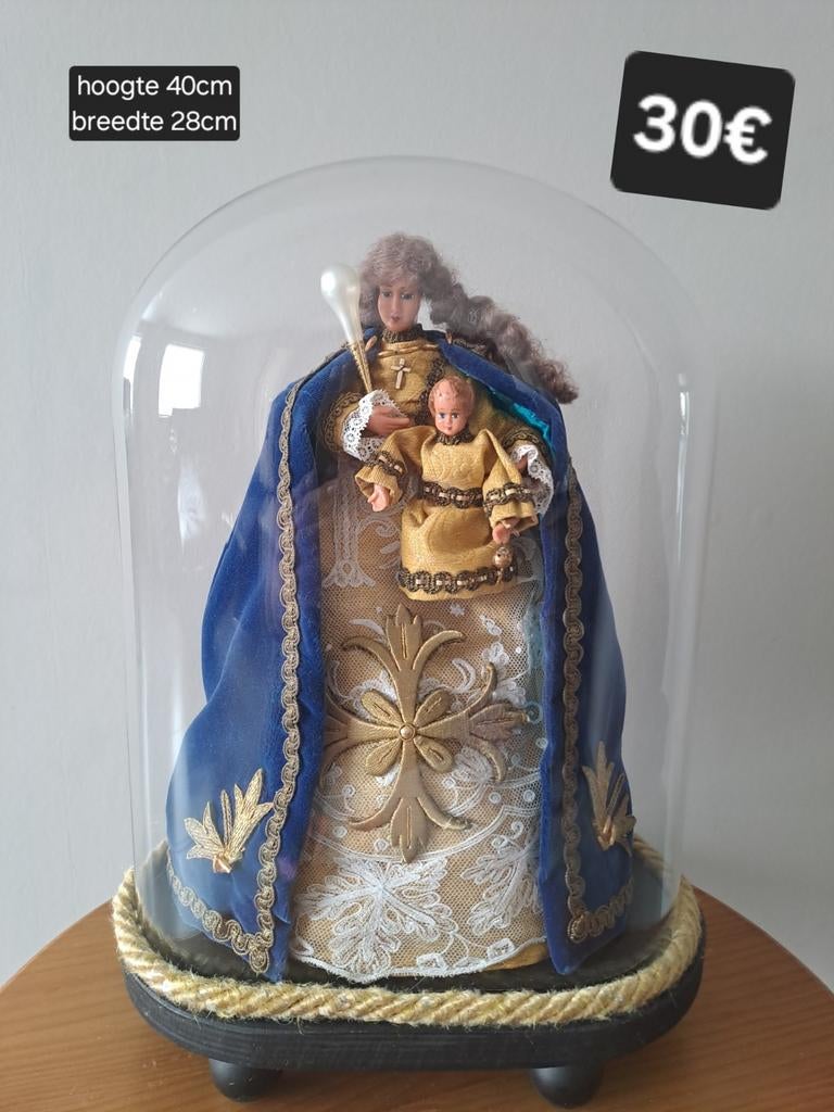 Madonna met kind onder glazen stolp, Ophalen