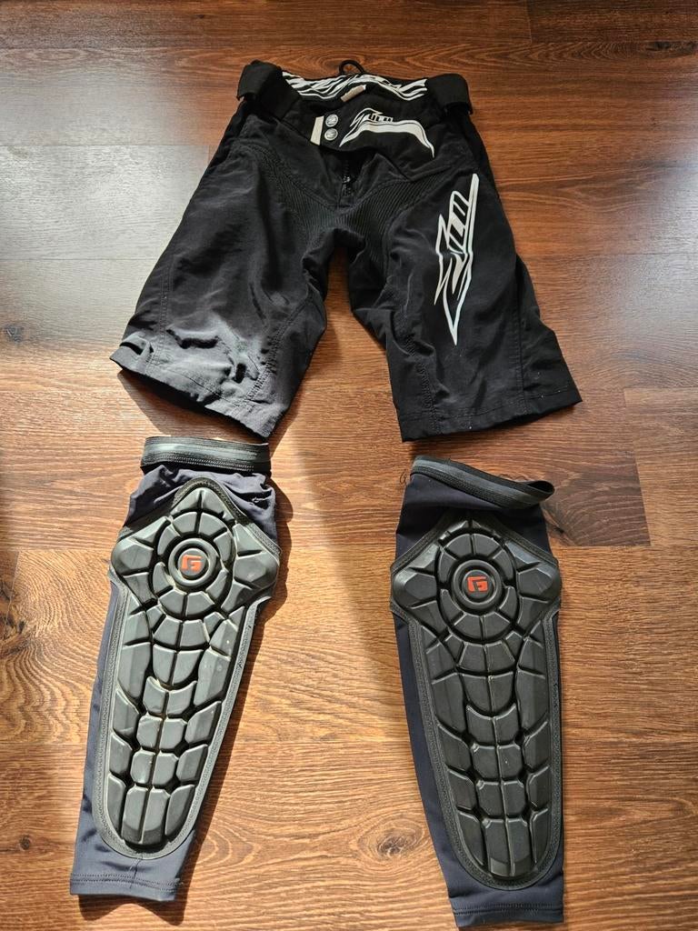 Bmx broek met been beenschermers, Ophalen