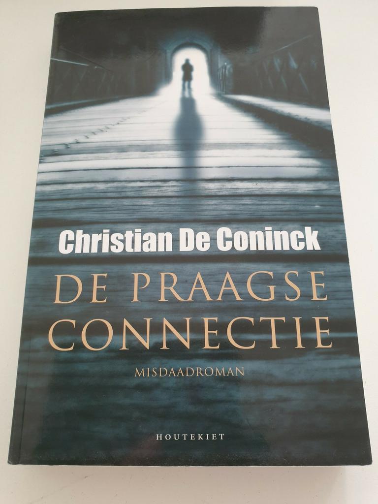 Christian De Coninck - De Praagse connectie, Boeken, Thrillers, Zo goed als nieuw, Ophalen of Verzenden