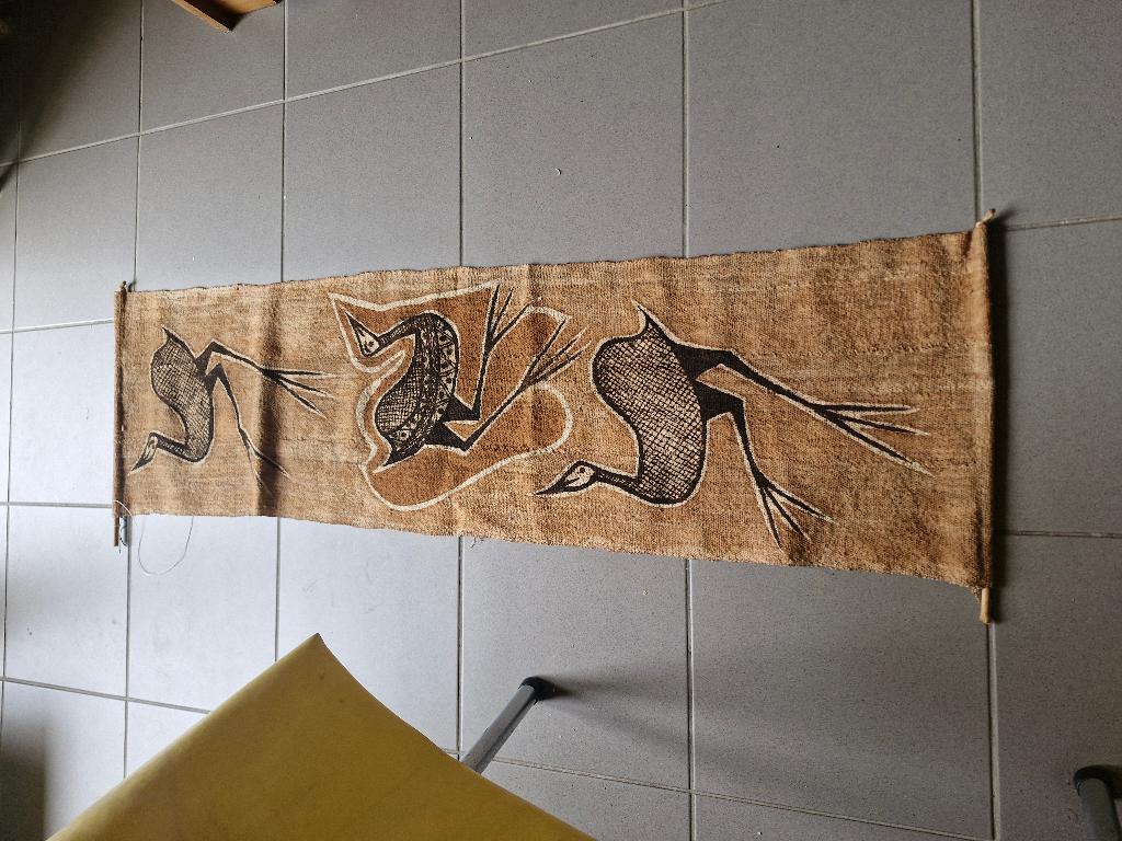 wandtapijt van vogels, Ophalen
