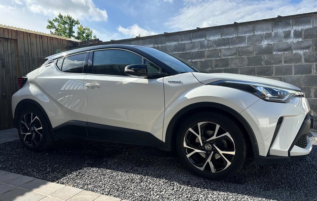 Toyota C-HR 2.0i Hybrid Keyless Led Navi Leder ACC Full Opti, Auto's, Toyota, Gebruikt, Euro 6, 4 cilinders, Wit