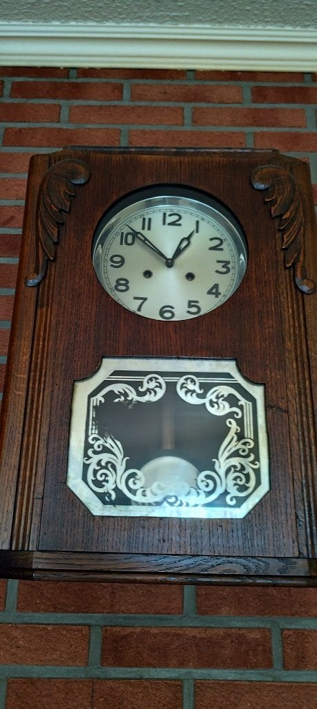 klassieke mechanische regulateur of carillon wandklok, Ophalen
