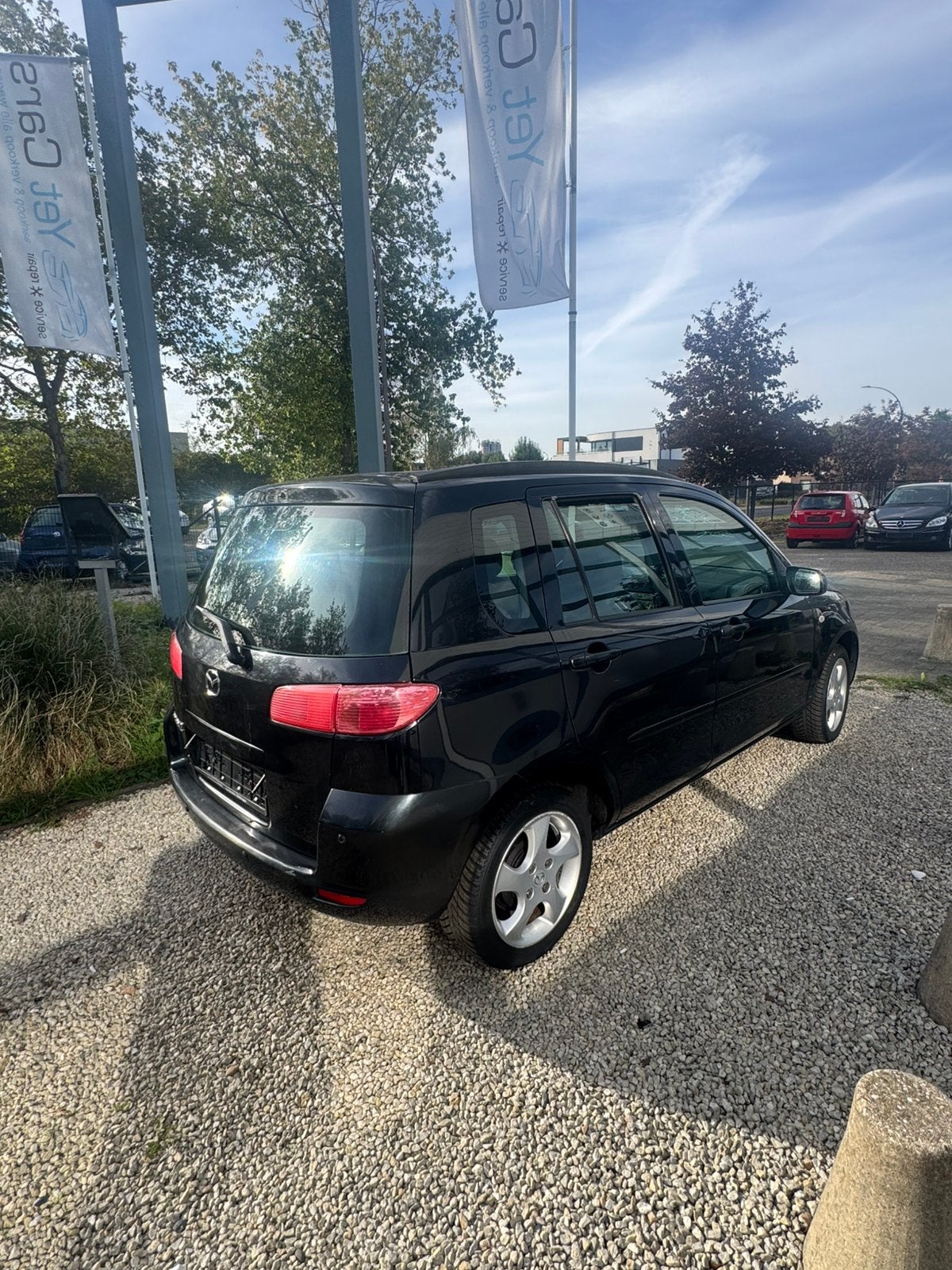 Mazda 2 benzine met keuring verkoop en garantie, Auto's, 4 deurs, Stof, 50 kW, Zwart