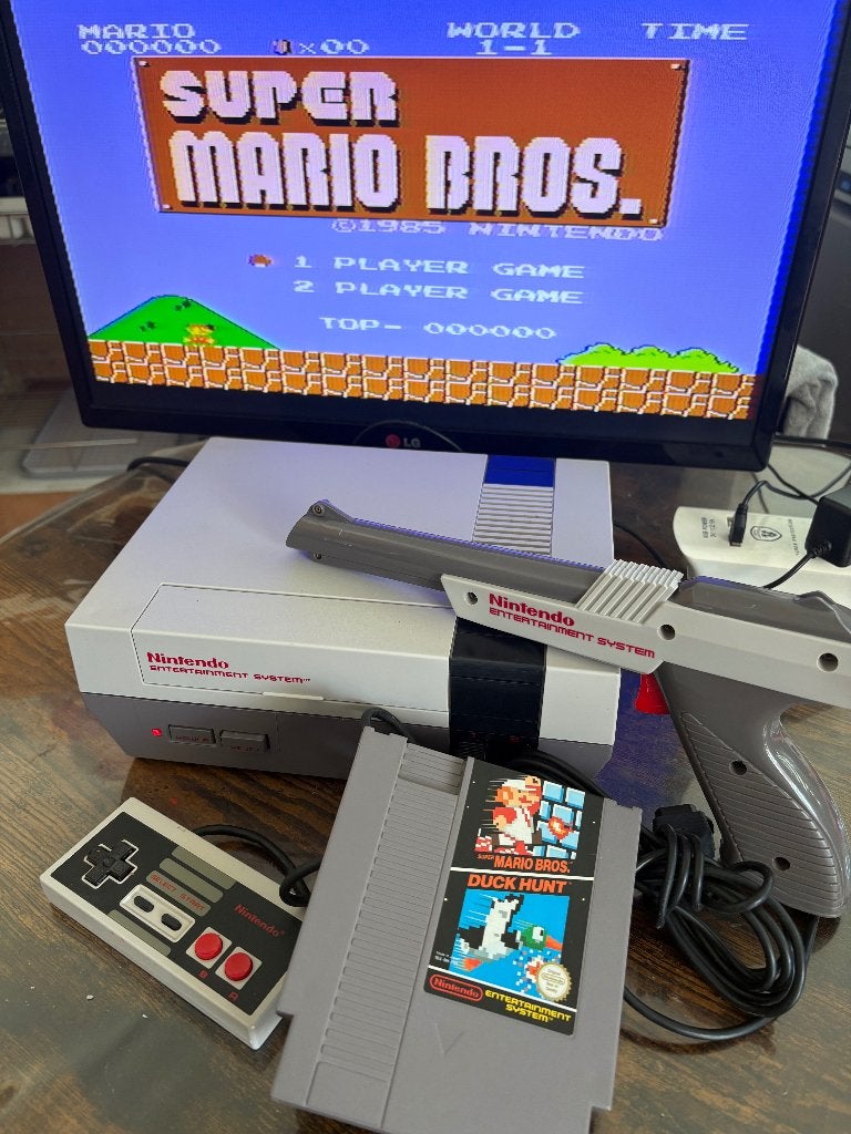 Nintendo Nes action set super Mario Bros + le pistolet, Enlèvement ou Envoi, Comme neuf, Avec 3 manettes ou plus, Avec jeux