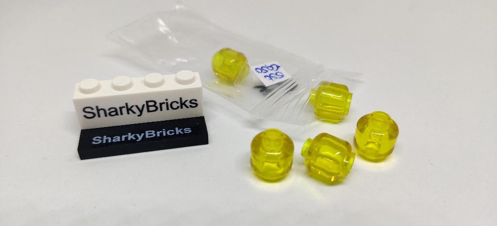 Lego Minifiguur hoofd transparant geel per 5 stuks (Nieuw), Overige thema's, Lego, Nieuw, Ophalen of Verzenden