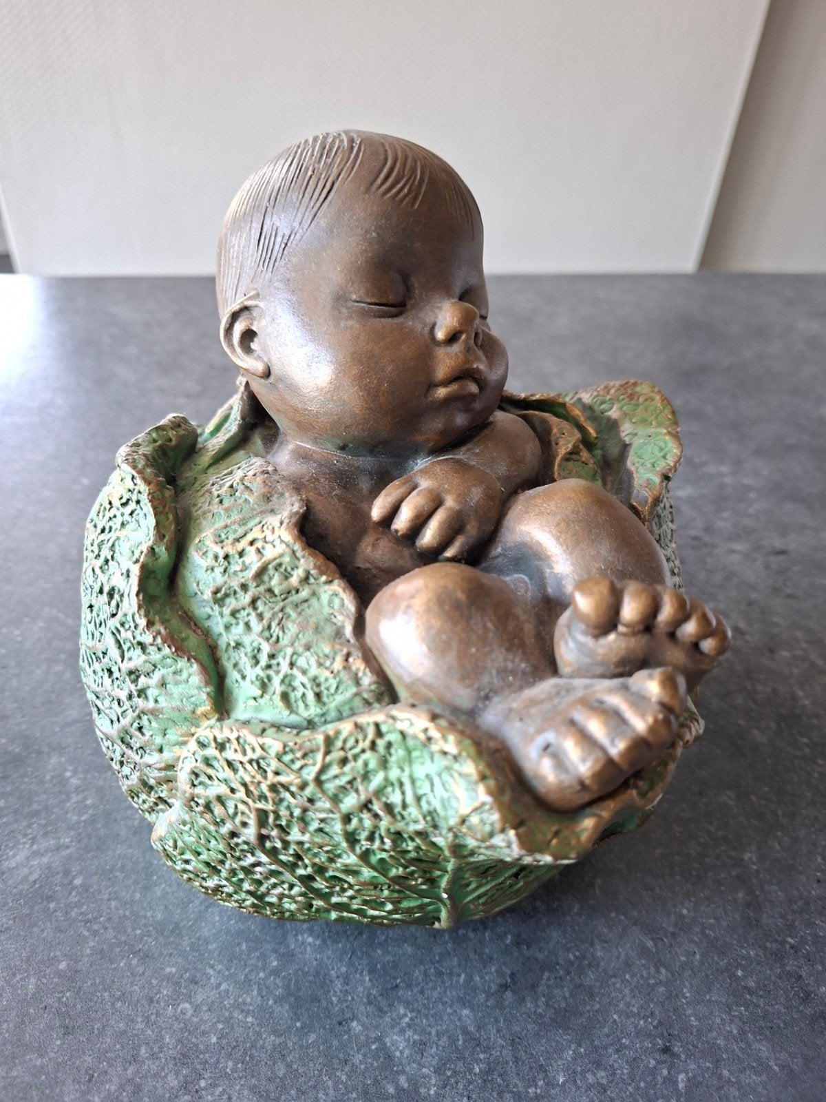 Perkeo "yourin Artiom" beeldje: baby in kool, Ophalen