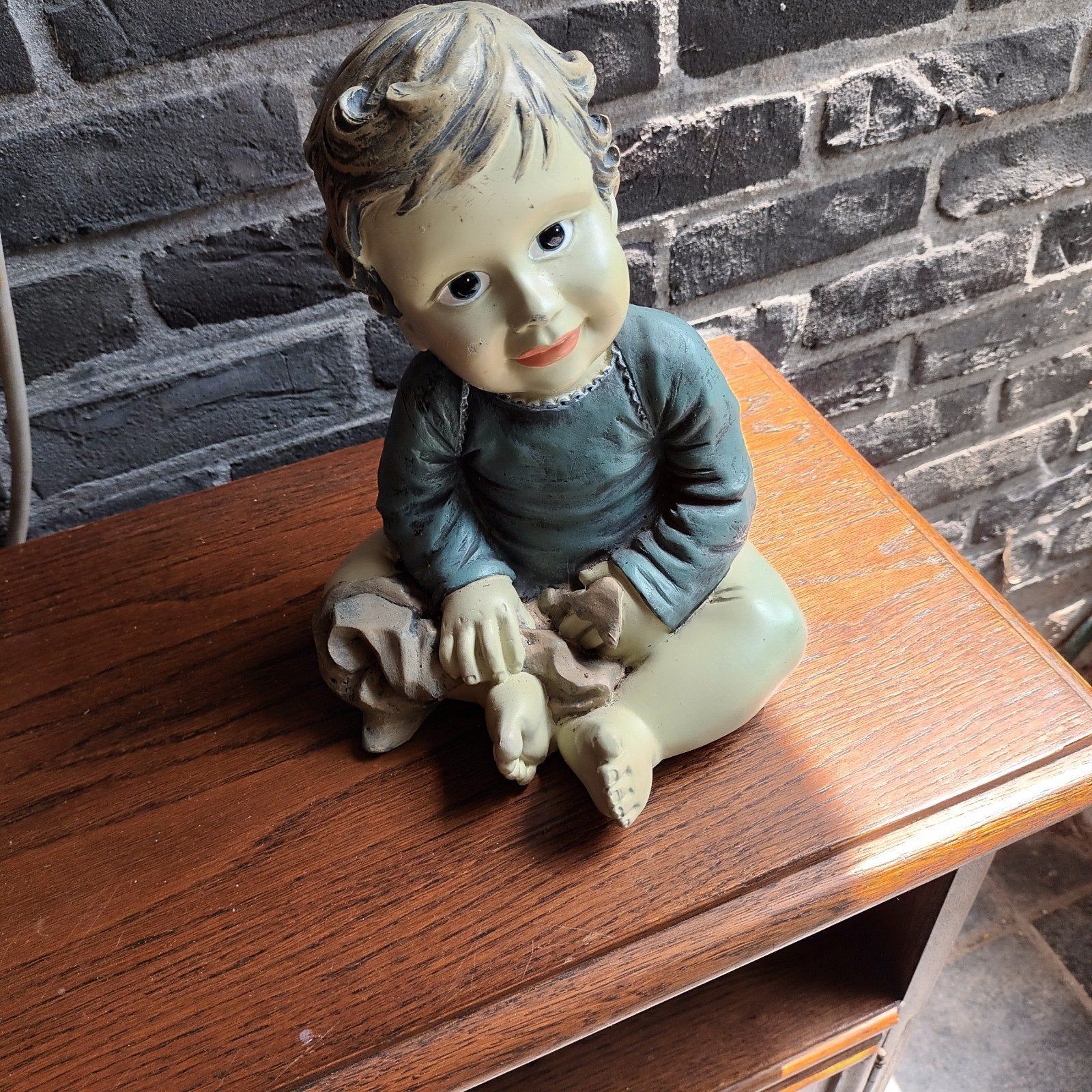 Beeld jongetje, Ophalen