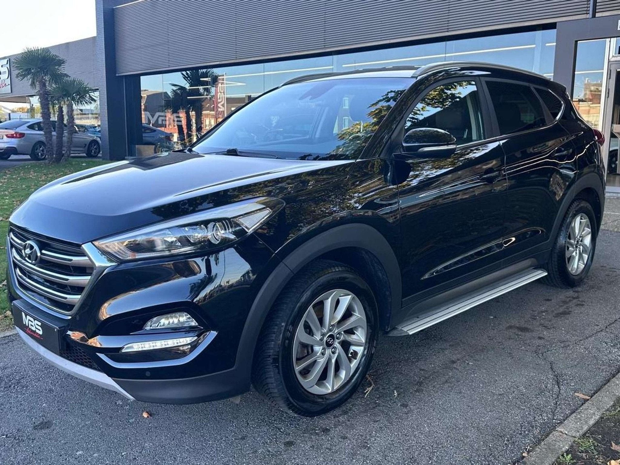Hyundai Tucson *1.6 GDi* NAVI* CAMERA* 1PROP* CLIM* CRUISE*, Auto's, Voorwielaandrijving, Gebruikt, Zwart, Leder