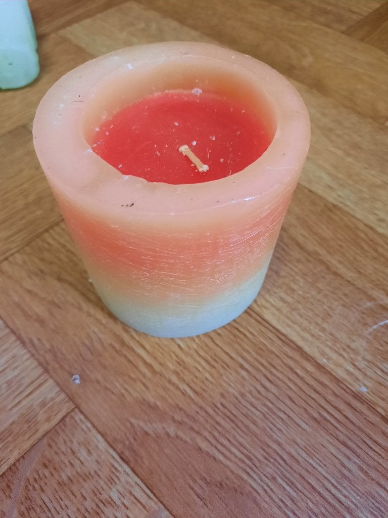 mooie tweekleurige kaars oranje/wit, Ophalen of Verzenden, Geel, Kaars
