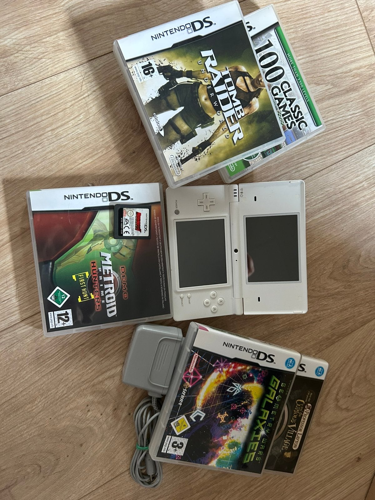 Nintendo DS lite en pen met camera en 6 spelletjes, Games en Spelcomputers, Games | Nintendo DS, 1 speler, Ophalen, Zo goed als nieuw