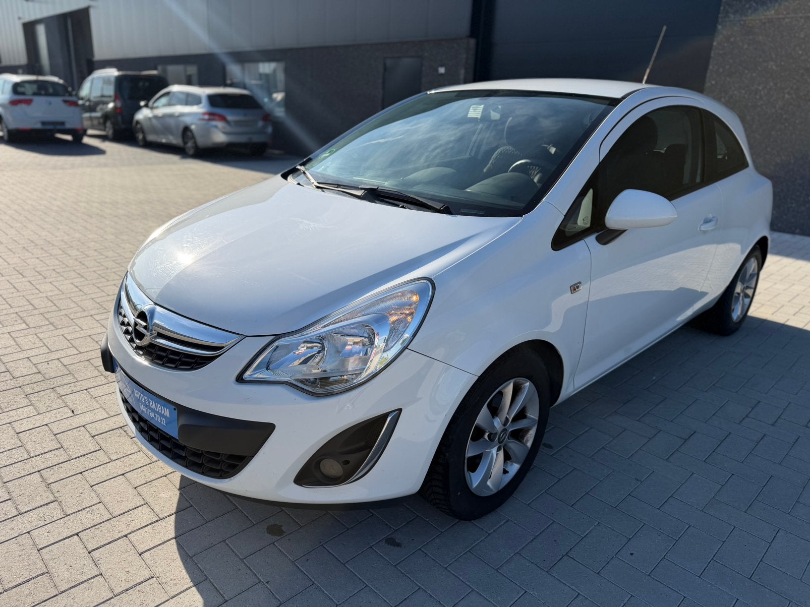 Opel Corsa 1.2 benzine 2013 142.700km, Auto's, Opel, Euro 5, Stof, Zwart, Lichtsensor