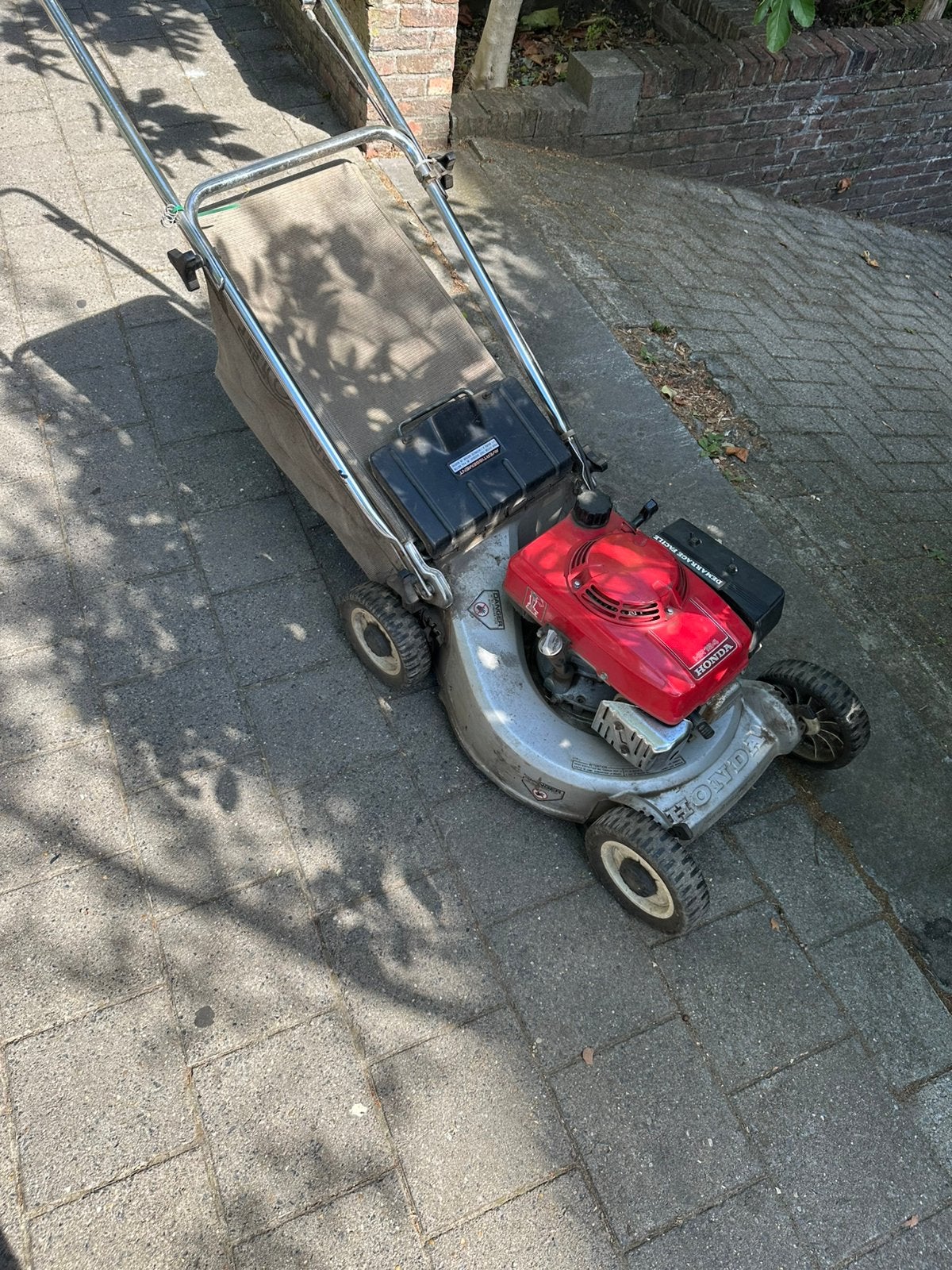 Tondeuse à gazon 2 temps Honda HR194 en parfait état, Enlèvement ou Envoi, Comme neuf, Tondeuses à gazon électriques