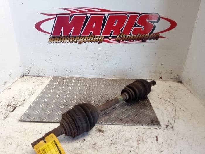Arbre de transmission avant gauche d'un Chevrolet Tacuma, -, 3 mois de garantie, Utilisé, -