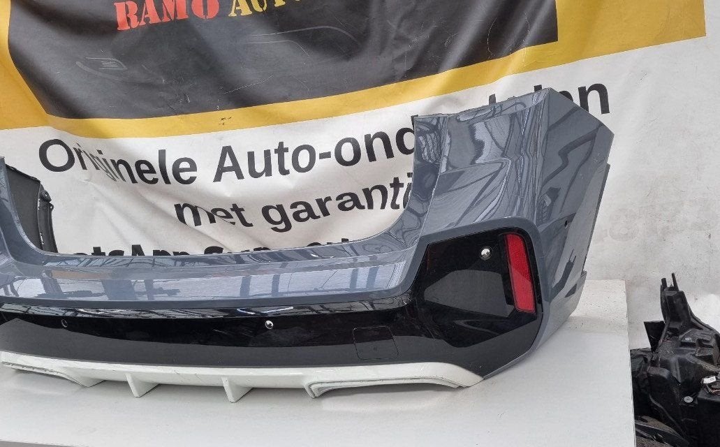 BMW X1 U11 ACHTERBUMPER M PAKKET ORIGINEEL PDC 51129881934, Autos : Pièces & Accessoires, Arrière, -, 3 mois de garantie, Utilisé