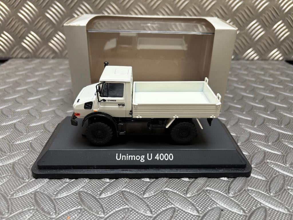 UNIMOG U 4000 MB UN-versie - NZG 1/43, Verzenden, Nieuw, Bus of Vrachtwagen, Overige merken