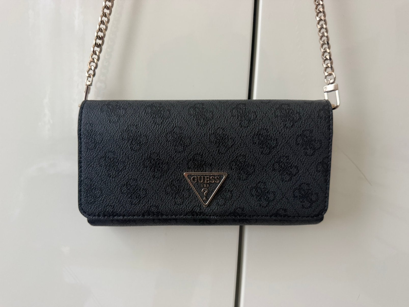 Tas van Guess, Ophalen, Zo goed als nieuw