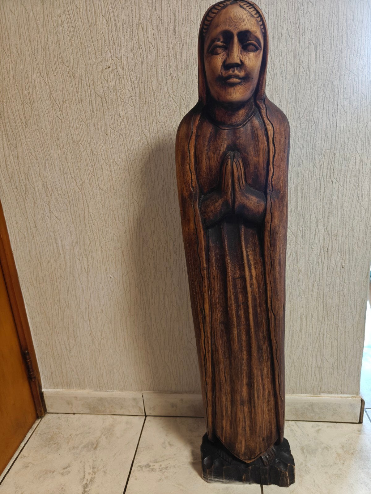 Oud houten beeld, Ophalen