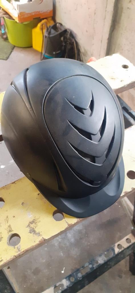 Paardrijhelm, Ophalen