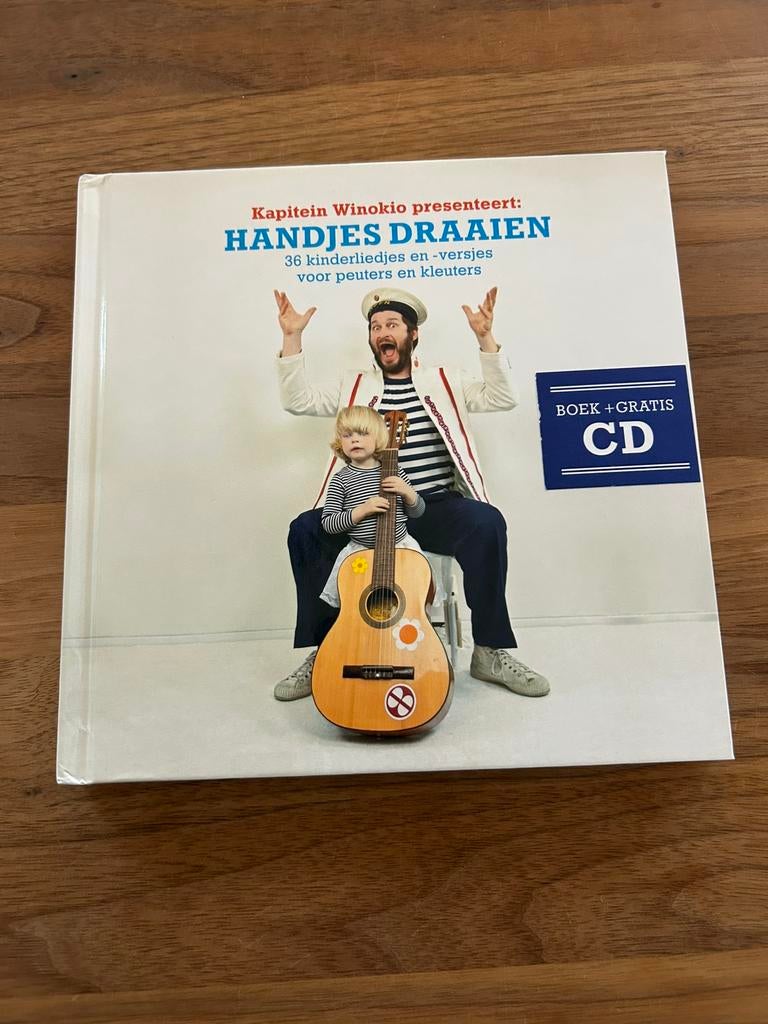 Boek met CD kapitein Winokio - handjes draaien, Boeken, Ophalen of Verzenden, Zo goed als nieuw, Fictie algemeen