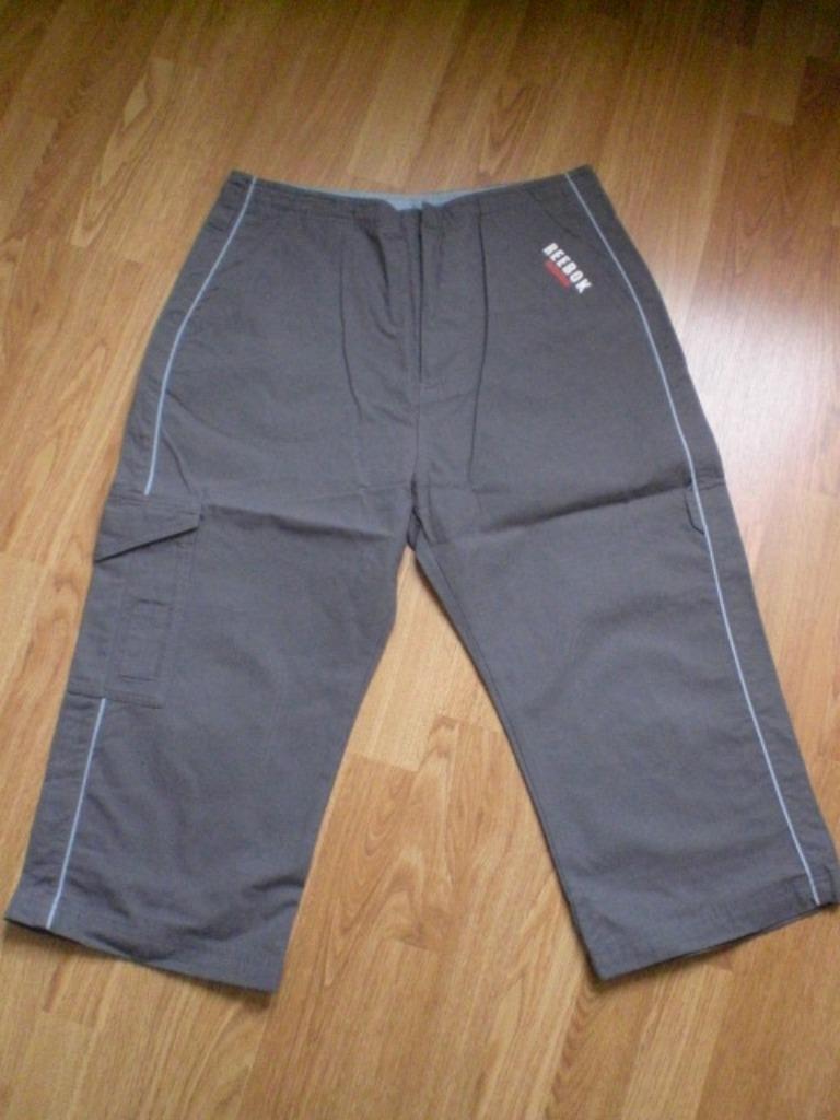 Reebok sportbroek grijs met blauwe accenten maat (xl), Verzenden, Maat 56/58 (XL), Zo goed als nieuw, Reebok