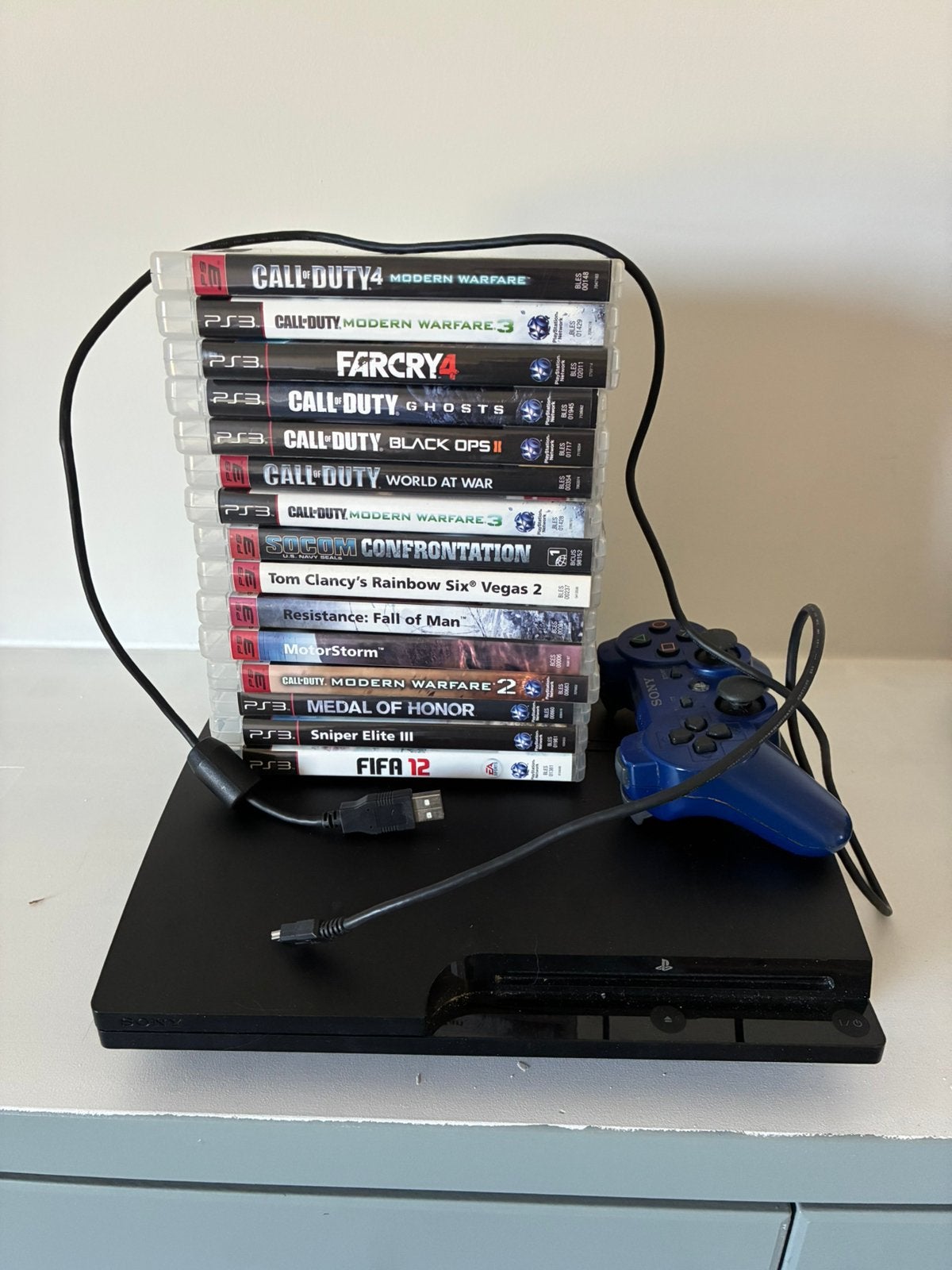 PS 3 met 15 spelletjes en controller, Envoi, Utilisé, Avec 1 manette