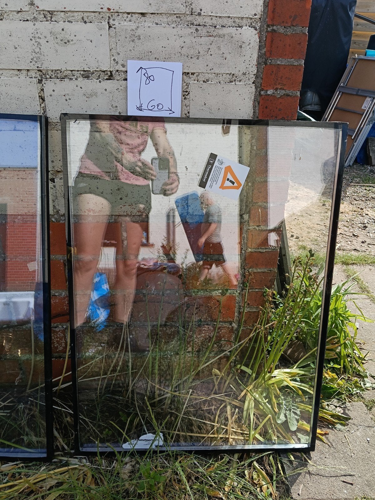 Nieuw dubbel glasraam, Ophalen