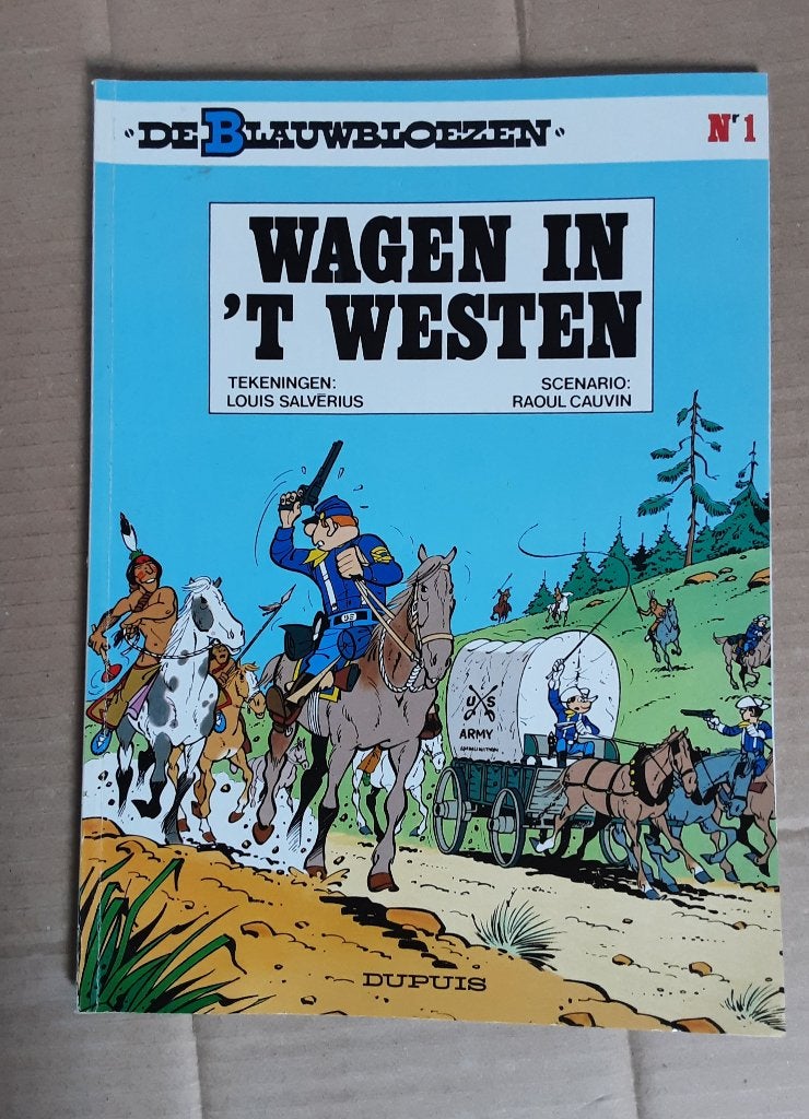 De blauwbloezen nr. 1 “Wagen in’t westen”., Boeken, Eén stripboek, Ophalen of Verzenden, Cauvin / Lambil, Gelezen