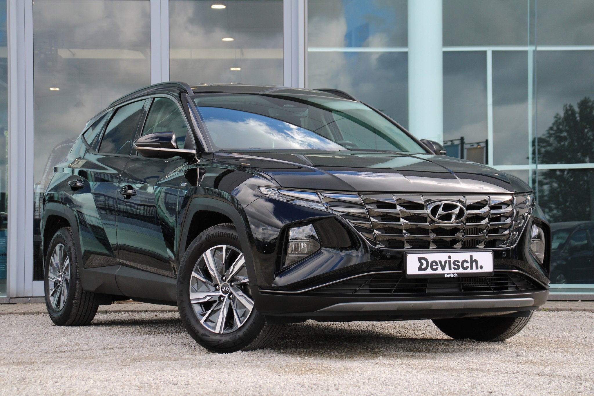 Hyundai Tucson 48V 1.6T MHEV Feel Automaat *CAM*NAVI*GARANTI, Entreprise, Carnet d'entretien, Noir, 5 portes